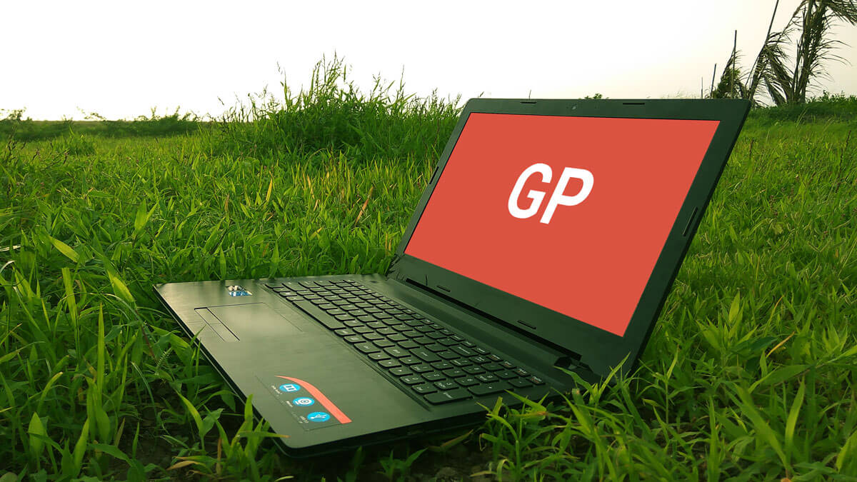 Laptop on Grass Mockup PSD